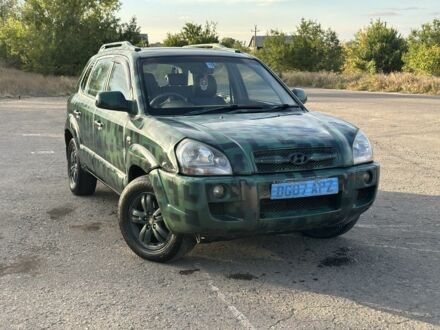Зеленый Хендай Туксон, объемом двигателя 2 л и пробегом 130 тыс. км за 2500 $, фото 1 на Automoto.ua