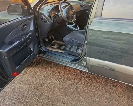 Зеленый Хендай Туксон, объемом двигателя 2 л и пробегом 240 тыс. км за 7200 $, фото 1 на Automoto.ua