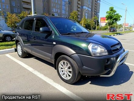 Зеленый Хендай Туксон, объемом двигателя 2 л и пробегом 203 тыс. км за 7200 $, фото 1 на Automoto.ua