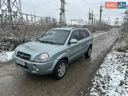 Зелений Хендай Туксон, об'ємом двигуна 2 л та пробігом 248 тис. км за 6999 $, фото 1 на Automoto.ua