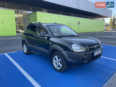 Зеленый Хендай Туксон, объемом двигателя 1.98 л и пробегом 195 тыс. км за 8000 $, фото 1 на Automoto.ua