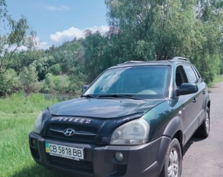 Зеленый Хендай Туксон, объемом двигателя 2 л и пробегом 280 тыс. км за 7000 $, фото 1 на Automoto.ua