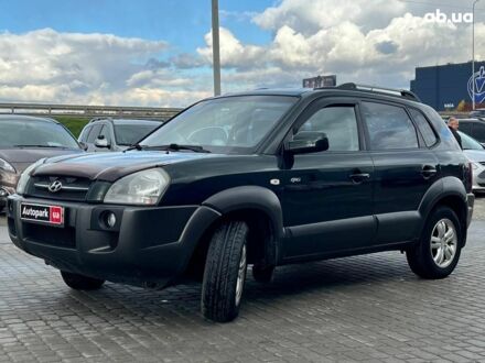 Зеленый Хендай Туксон, объемом двигателя 2 л и пробегом 223 тыс. км за 8540 $, фото 1 на Automoto.ua