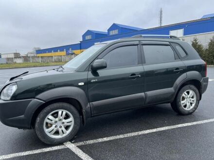 Зеленый Хендай Туксон, объемом двигателя 2 л и пробегом 230 тыс. км за 7900 $, фото 1 на Automoto.ua