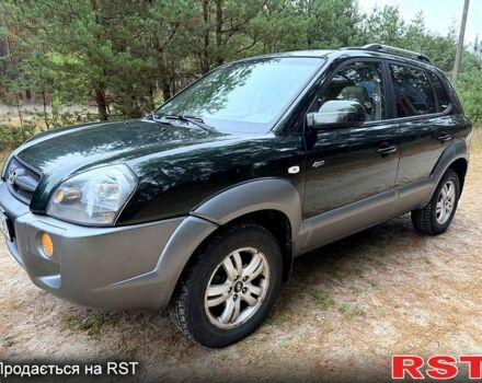 Зелений Хендай Туксон, об'ємом двигуна 2 л та пробігом 185 тис. км за 7950 $, фото 1 на Automoto.ua