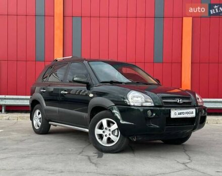 Зеленый Хендай Туксон, объемом двигателя 1.99 л и пробегом 214 тыс. км за 7290 $, фото 1 на Automoto.ua