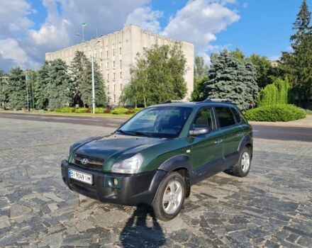 Зеленый Хендай Туксон, объемом двигателя 2 л и пробегом 226 тыс. км за 6499 $, фото 1 на Automoto.ua