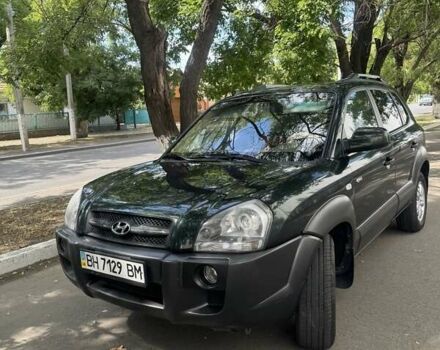 Зеленый Хендай Туксон, объемом двигателя 1.98 л и пробегом 124 тыс. км за 8700 $, фото 1 на Automoto.ua