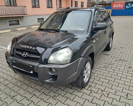 Зеленый Хендай Туксон, объемом двигателя 1.98 л и пробегом 280 тыс. км за 7200 $, фото 1 на Automoto.ua