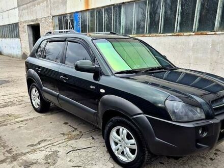 Зелений Хендай Туксон, об'ємом двигуна 2 л та пробігом 276 тис. км за 9000 $, фото 1 на Automoto.ua