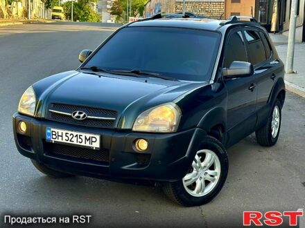 Зеленый Хендай Туксон, объемом двигателя 2 л и пробегом 172 тыс. км за 7000 $, фото 1 на Automoto.ua