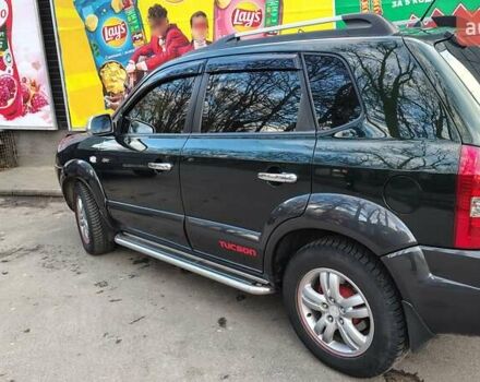 Зеленый Хендай Туксон, объемом двигателя 1.98 л и пробегом 245 тыс. км за 7800 $, фото 1 на Automoto.ua