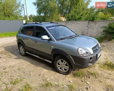 Зелений Хендай Туксон, об'ємом двигуна 1.98 л та пробігом 118 тис. км за 9200 $, фото 1 на Automoto.ua