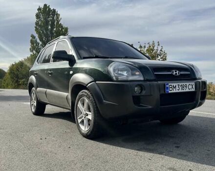 Зелений Хендай Туксон, об'ємом двигуна 1.98 л та пробігом 238 тис. км за 7700 $, фото 1 на Automoto.ua