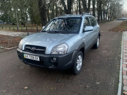 Зеленый Хендай Туксон, объемом двигателя 2 л и пробегом 223 тыс. км за 7950 $, фото 1 на Automoto.ua