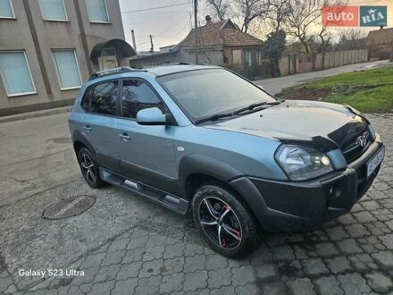 Зеленый Хендай Туксон, объемом двигателя 1.98 л и пробегом 158 тыс. км за 8300 $, фото 1 на Automoto.ua