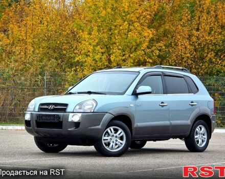 Зеленый Хендай Туксон, объемом двигателя 2 л и пробегом 115 тыс. км за 9700 $, фото 1 на Automoto.ua