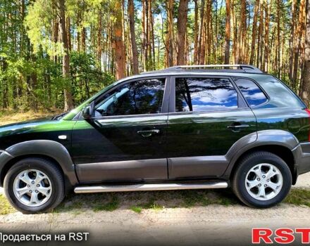 Зеленый Хендай Туксон, объемом двигателя 2 л и пробегом 190 тыс. км за 8500 $, фото 1 на Automoto.ua