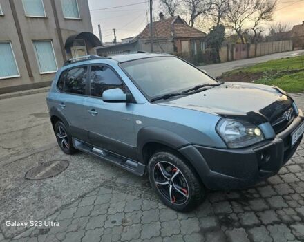 Зеленый Хендай Туксон, объемом двигателя 2 л и пробегом 150 тыс. км за 8331 $, фото 1 на Automoto.ua