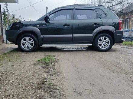 Зеленый Хендай Туксон, объемом двигателя 2 л и пробегом 108 тыс. км за 8700 $, фото 1 на Automoto.ua