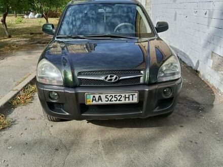 Зеленый Хендай Туксон, объемом двигателя 2 л и пробегом 140 тыс. км за 8800 $, фото 1 на Automoto.ua