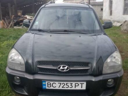 Зеленый Хендай Туксон, объемом двигателя 1.99 л и пробегом 281 тыс. км за 8500 $, фото 1 на Automoto.ua