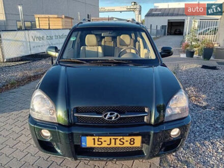 Зеленый Хендай Туксон, объемом двигателя 2 л и пробегом 183 тыс. км за 8900 $, фото 1 на Automoto.ua