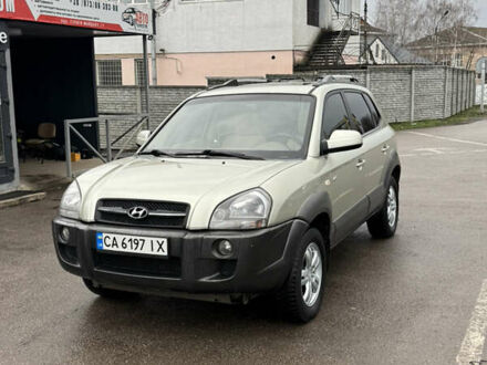 Зеленый Хендай Туксон, объемом двигателя 1.98 л и пробегом 133 тыс. км за 7700 $, фото 1 на Automoto.ua