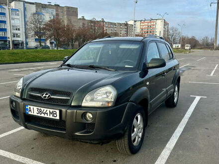 Зеленый Хендай Туксон, объемом двигателя 1.98 л и пробегом 156 тыс. км за 7999 $, фото 1 на Automoto.ua