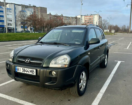 Зеленый Хендай Туксон, объемом двигателя 1.98 л и пробегом 156 тыс. км за 7999 $, фото 1 на Automoto.ua