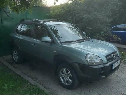 Зеленый Хендай Туксон, объемом двигателя 2.66 л и пробегом 166 тыс. км за 8500 $, фото 1 на Automoto.ua