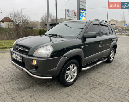 Зеленый Хендай Туксон, объемом двигателя 1.98 л и пробегом 295 тыс. км за 5950 $, фото 1 на Automoto.ua