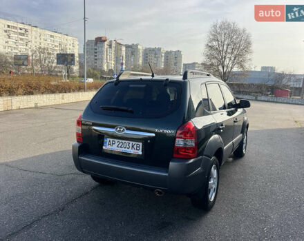 Зеленый Хендай Туксон, объемом двигателя 1.98 л и пробегом 130 тыс. км за 9100 $, фото 1 на Automoto.ua