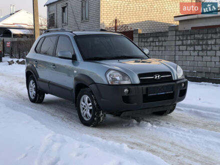 Зеленый Хендай Туксон, объемом двигателя 2 л и пробегом 111 тыс. км за 9400 $, фото 1 на Automoto.ua
