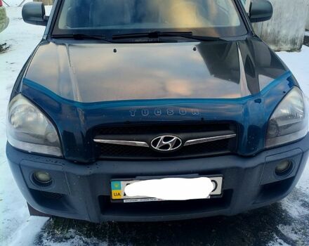 Зеленый Хендай Туксон, объемом двигателя 2 л и пробегом 154 тыс. км за 12960 $, фото 1 на Automoto.ua