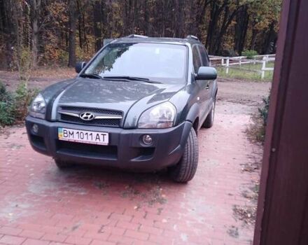 Зеленый Хендай Туксон, объемом двигателя 1.98 л и пробегом 146 тыс. км за 10000 $, фото 1 на Automoto.ua