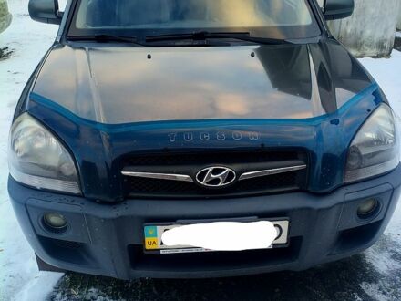 Зелений Хендай Туксон, об'ємом двигуна 2 л та пробігом 154 тис. км за 12960 $, фото 1 на Automoto.ua