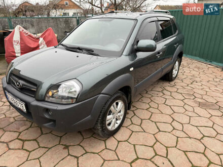 Зелений Хендай Туксон, об'ємом двигуна 2 л та пробігом 65 тис. км за 12250 $, фото 1 на Automoto.ua