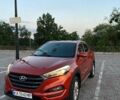 Оранжевый Хендай Туксон, объемом двигателя 2 л и пробегом 94 тыс. км за 18500 $, фото 1 на Automoto.ua