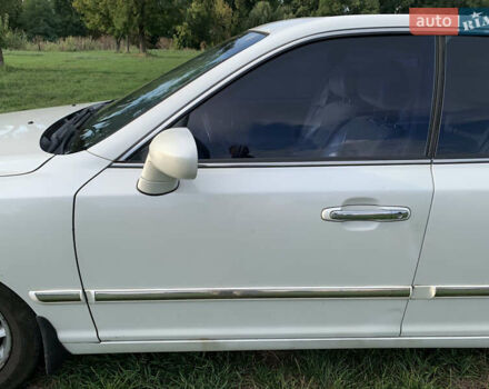 Хендай КСГ 2004 в Александрие на Automoto.ua Белый Хендай КСГ, объемом двигателя 3.5 л и пробегом 222 тыс. км за 3631 $, фото 14 на Automoto.ua