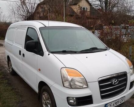 Белый Хендай H-1, объемом двигателя 2.48 л и пробегом 267 тыс. км за 4200 $, фото 1 на Automoto.ua