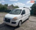 Белый Хендай H-1, объемом двигателя 2.48 л и пробегом 328 тыс. км за 3700 $, фото 1 на Automoto.ua