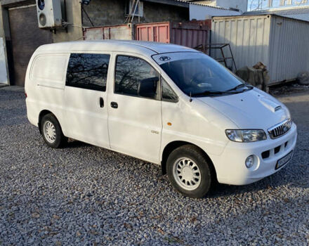 Белый Хендай H-1, объемом двигателя 2.5 л и пробегом 309 тыс. км за 6499 $, фото 1 на Automoto.ua