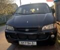 Черный Хендай H-1, объемом двигателя 2.5 л и пробегом 330 тыс. км за 3000 $, фото 2 на Automoto.ua