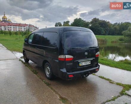 Черный Хендай H-1, объемом двигателя 2.47 л и пробегом 280 тыс. км за 8500 $, фото 23 на Automoto.ua