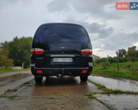 Черный Хендай H-1, объемом двигателя 2.47 л и пробегом 280 тыс. км за 8500 $, фото 21 на Automoto.ua