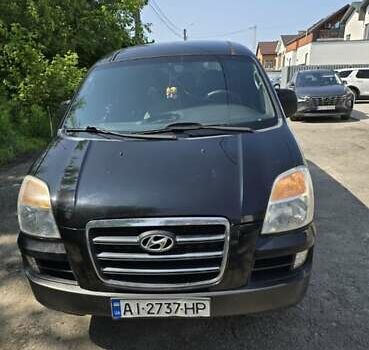 Черный Хендай H-1, объемом двигателя 2.4 л и пробегом 255 тыс. км за 8200 $, фото 13 на Automoto.ua