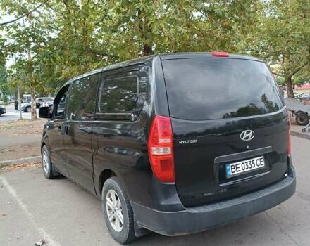 Черный Хендай H-1, объемом двигателя 2.5 л и пробегом 293 тыс. км за 9999 $, фото 5 на Automoto.ua