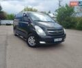 Черный Хендай H-1, объемом двигателя 2.5 л и пробегом 249 тыс. км за 12399 $, фото 1 на Automoto.ua