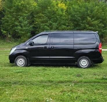 Черный Хендай H-1, объемом двигателя 2.5 л и пробегом 269 тыс. км за 11000 $, фото 4 на Automoto.ua